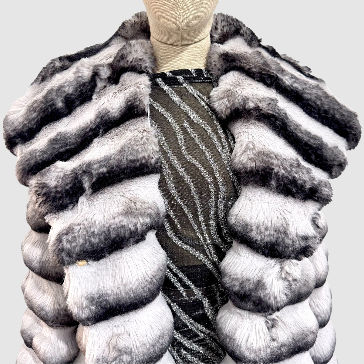 Manteau fausse fourrure